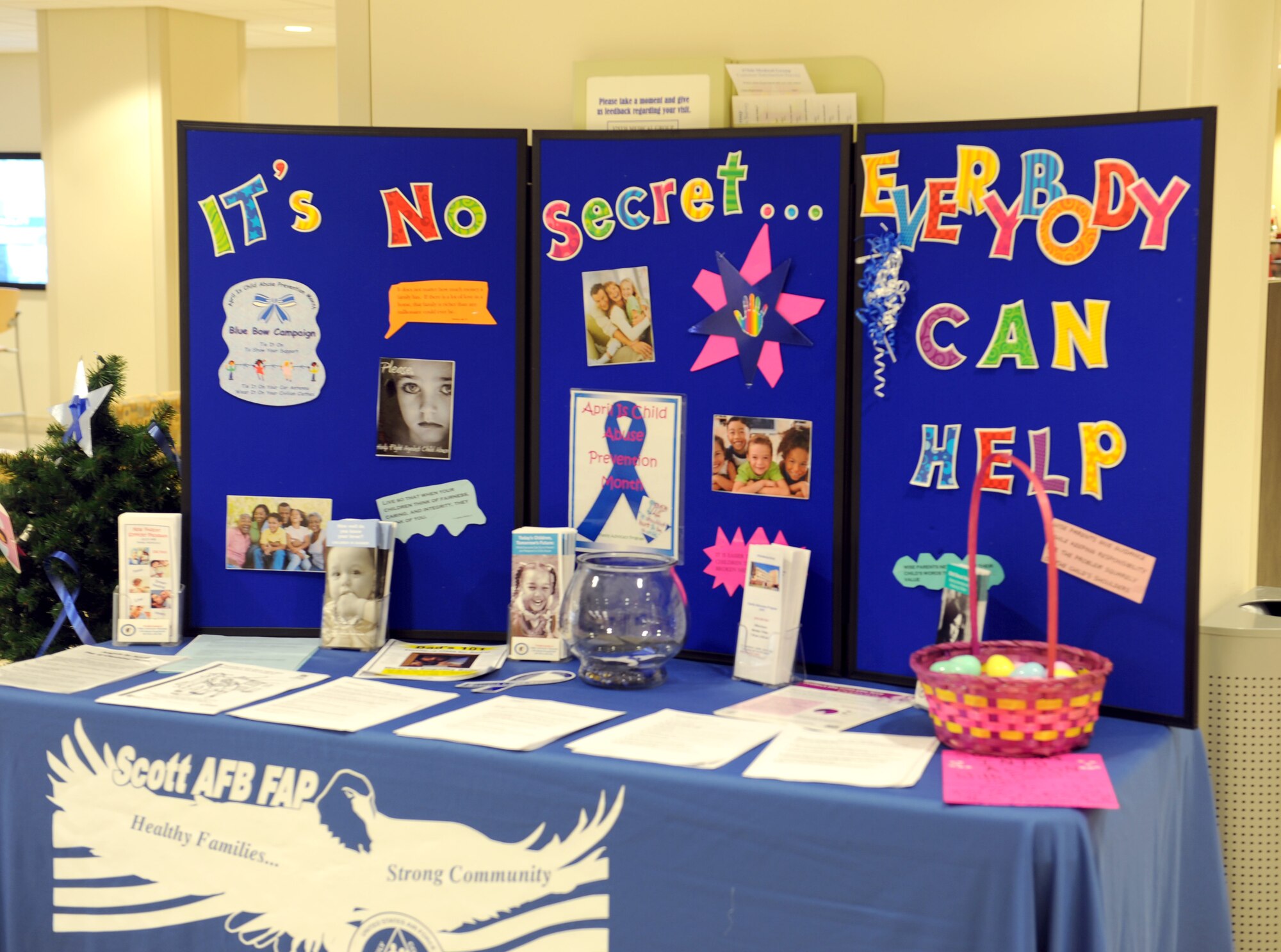 April is Child Abuse Prevention Month and brings attention to child abuse and neglect by educating parents, caregivers, children and the community on how to prevent it.  Family Advocacy Program display tables with pamphlets, brochures and handouts with information on child abuse can be found in the 375th Medical Group and in the base library. (U.S. Air Force photo/Staff Sgt. Maria Bowman)