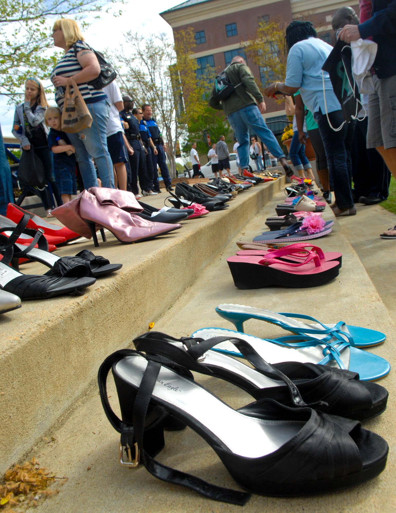 Donors from across the Hampton Roads communities contributed high-heels and sandals for the annual “Walk a Mile in Her Shoes” event in Hampton, Va., April 13, 2013. Participants put on the shoes to show the support for victims of sexual violence. (U.S. Air Force photo by Airman 1st Class Austin Harvill/Released)