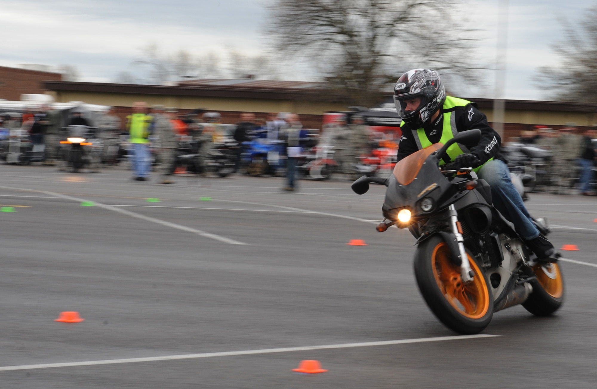 Staff Sgt. Ryan Schmettgoecke, 509th Munitions Squadron live delivery crew chief, participates in the Grant’s Gauntlet challenge during the annual Motorcycle Awareness and Safety Day at Whiteman Air Force Base, Mo., April 15, 2013. Riders should follow the TCLOCKS, (tires and wheels, controls, lights, oil, chassis and kickstand) pre-ride inspection before all rides. (U.S. Air Force photo by Airman 1st Class Bryan Crane/Released)
