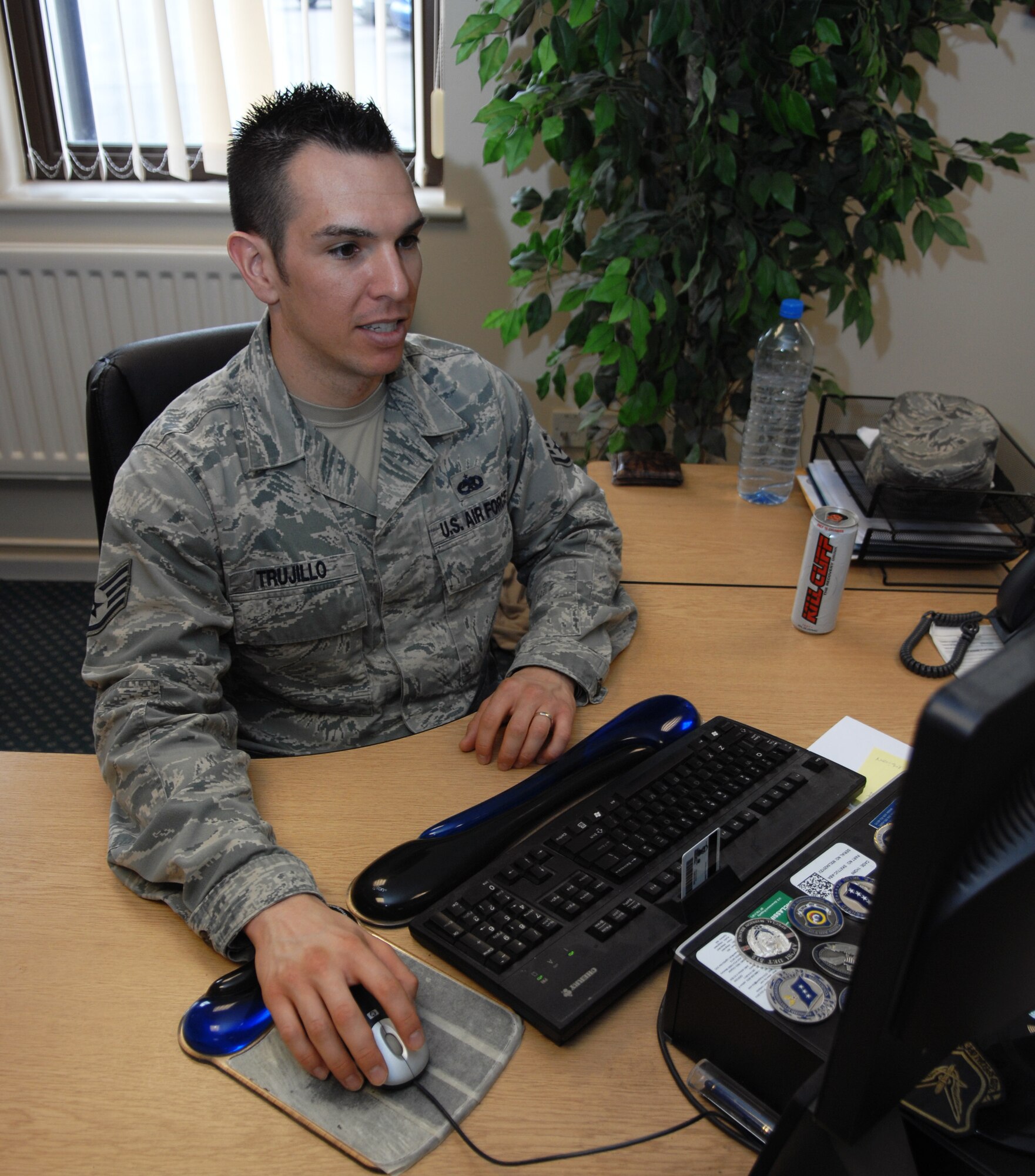 Staff Sgt. Phillip Trujillo, dorm 107 Airmen dorm leader from Yuba City, Calif., inprocesses new Airmen April 17, 2013, on RAF Mildenhall, England.  As an Airmen dorm leader, Trujillo is responsible for mentoring Airmen, maintaining the dorm and outprocessing outbound Airmen. (U.S. Air Force photo by Airman 1st Class Dillon Johnston/Released)