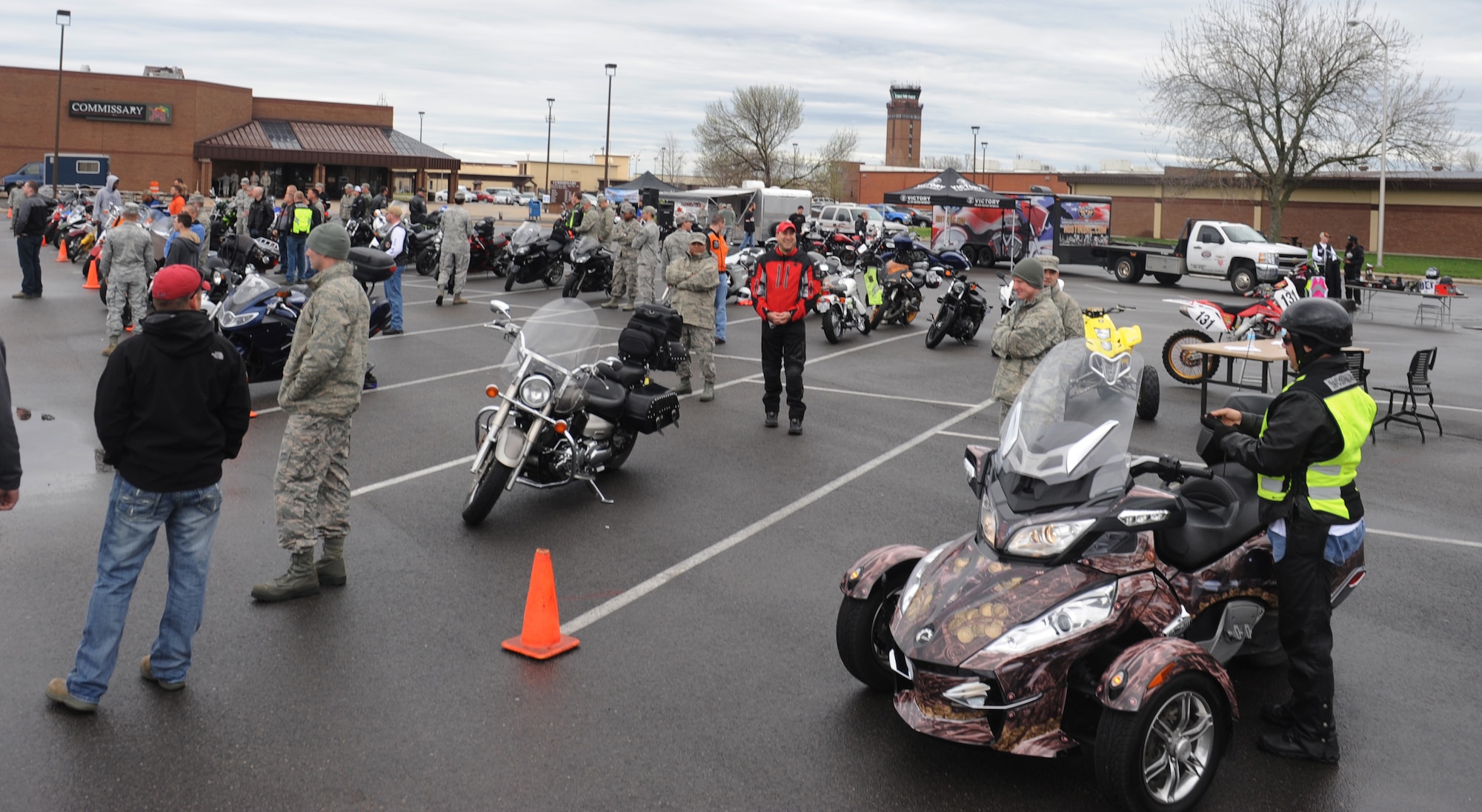 Members of Team Whiteman participate in the annual Motorcycle Awareness and Safety Day at Whiteman Air Force Base, Mo., April 15, 2013. The event was held in the commissary parking lot to raise awareness for safe motorcycle riding practices. (U.S. Air Force photo by Airman 1st Class Bryan Crane/Released)
