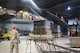 A team comprised of 402nd AMXG, 116th ACW and 461st ACW personnel known as the Crash, Disabled, Damage and Recovery Team, keep a close eye on the lifting of the SR-71 onto three stands giving the aircraft a takeoff profile at the Museum of Aviation at Robins Air Force Base. (U.S. Air Force photo by Edward Aspera/Released)
