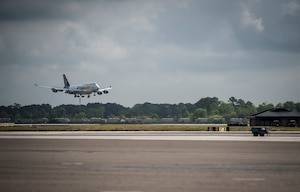 An aircraft carrying the 560th Red Horse Squadron lands at Joint Base Charleston – Air Base, S.C., April 11, 2013, after completing their first six-month deployment to the Southwest Asia region. The group arrived back home to a cheering crowd of family and friends.. (U.S. Air Force photo/ Senior Airman Dennis Sloan)