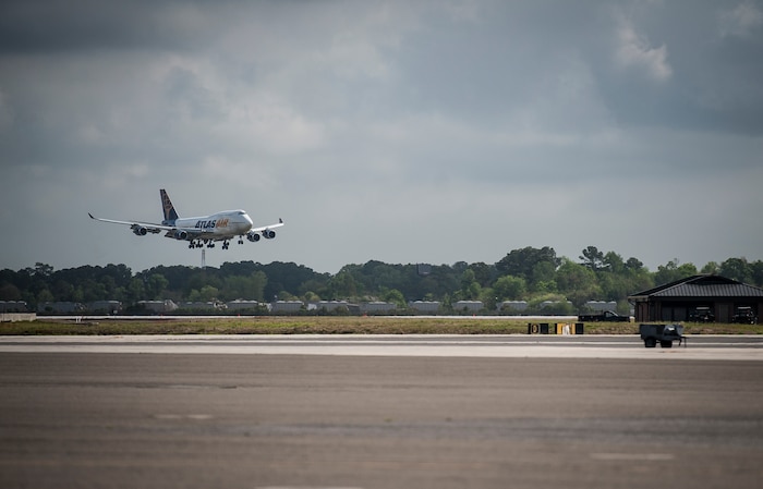 An aircraft carrying the 560th Red Horse Squadron lands at Joint Base Charleston – Air Base, S.C., April 11, 2013, after completing their first six-month deployment to the Southwest Asia region. The group arrived back home to a cheering crowd of family and friends.. (U.S. Air Force photo/ Senior Airman Dennis Sloan)