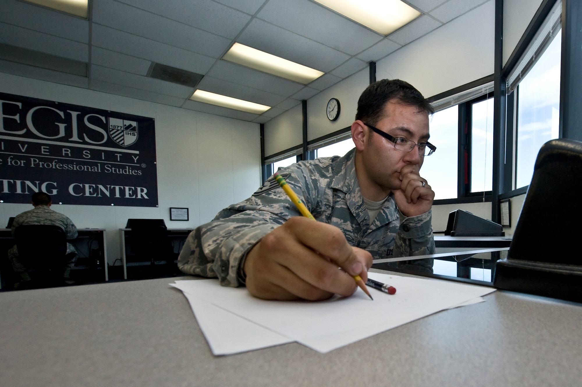 Staff Sgt William Olsen, 57th Maintenance Squadron Munitions Flight advisor, takes a College Level Examination Program test for College Algebra April 16, 2013, at the Nellis Air Force Base National Test Center. CLEP and DANTES tests are given Monday-Friday at 10 a.m. and 2 p.m. (U.S. Air Force photo by Senior Airman Matthew Lancaster)