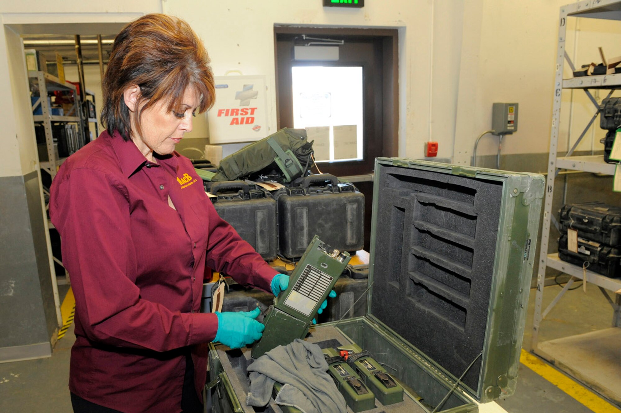 HILL AIR FORCE BASE, Utah -- Tamara Kentch-Jones, a member of the EOD Equipment Management Facility team here assembles and tests a MX-22 remote firing device. EOD Airmen use the MX-22 to remotely initiate demolition charges.  (U.S. Air Force photo/Todd Cromar)