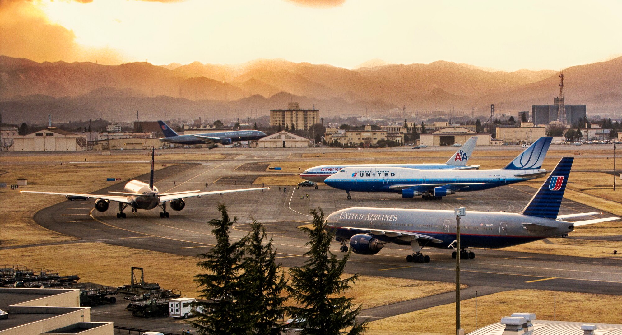 YOKOTA AIR BASE, Japan -- Several commercial aircraft diverted to Yokota from Narita International Airport, Tokyo, Japan, after it closed in response to an earthquake that hit mainland Japan at 2:50 p.m. March 11. (U.S. Air Force photo/Master Sgt. Matthew Summers)
