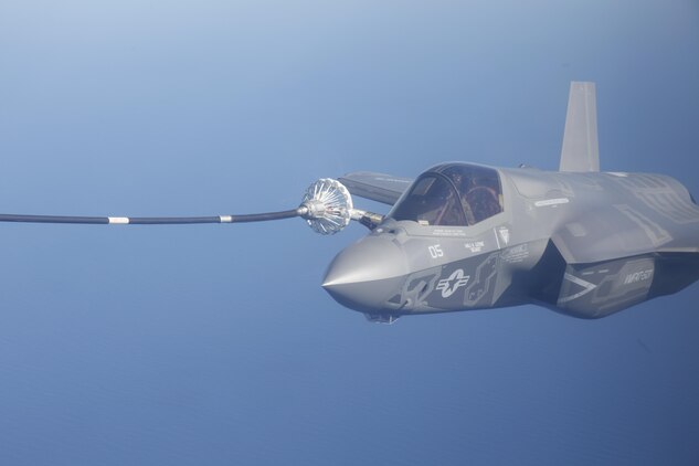 An F-35B Lighting II with Marine Fighter Attack Training Squadron 501 takes on fuel from a Marine Aerial Refueler Transport Squadron 252 KC-130J Hercules during a training exercise over the Atlantic Ocean April 9. 