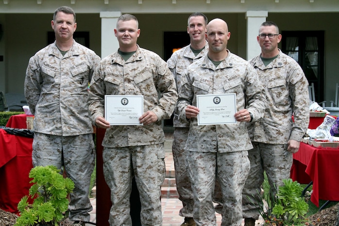(From left to right) Col. Wayne A. Sincliar, Cpl. Daniel Contios, Lt. Col. George A. Williams, Staff Sgt. Jeremy Loux, and Sgt. Maj. Michael D. Brookman, all Marines with Headquarters and Service Battalion, attended the "Aloha, Grow With Us" recognition luncheon hosted by the Navy-Marine Corps Relief Society aboard Marine Corps Recruit Depot San Diego April 16. Loux and Contios received a Certification of Appreciation for providing better security for the NMCRS office.  The luncheon was to show gratitude to the volunteers who contributed to the mission of the society, which included 18 active duty Marines. Thirty-three volunteers were recognized for more than 21,100 hours donated to support the society.