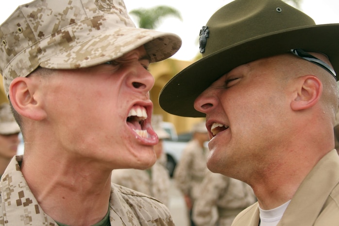 A recruit of Company A, 1st Recruit Training Battalion, endures the challenges of a senior drill instructor uniform inspection aboard Marine Corps Recruit Depot San Diego April 5.  During inspection recruits are tested on knowledge and bearing. 