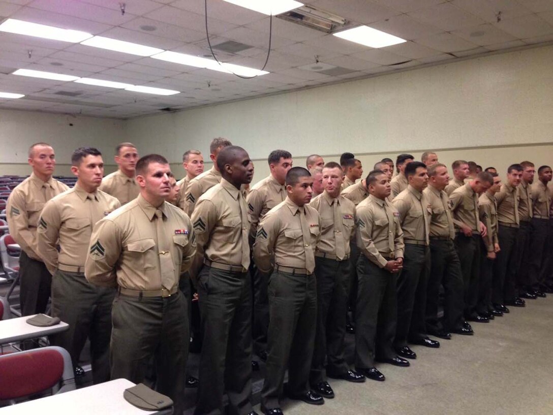 Corporals Leadership Summit 1-13 – Graduation Practice – Corporal Barnes (front left) from Charlie Company prepares to call the class to attention during grad practice.
