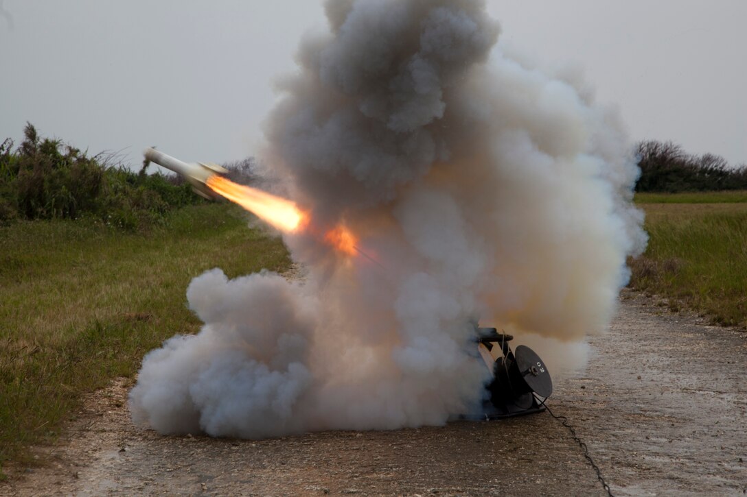 IE SHIMA, OKINAWA, Japan –A “smokey” surface-to-air missile is launched April 12 during training on Ie Shima. Smokey SAMs were designed to give off the a distinct heat signature when launched, allowing for realistic evasion training for pilots. The smokey SAM is harmless, as it is made of foam. (U.S. Marine Corps photo by Lance Cpl. Ian M. McMahon/Released)