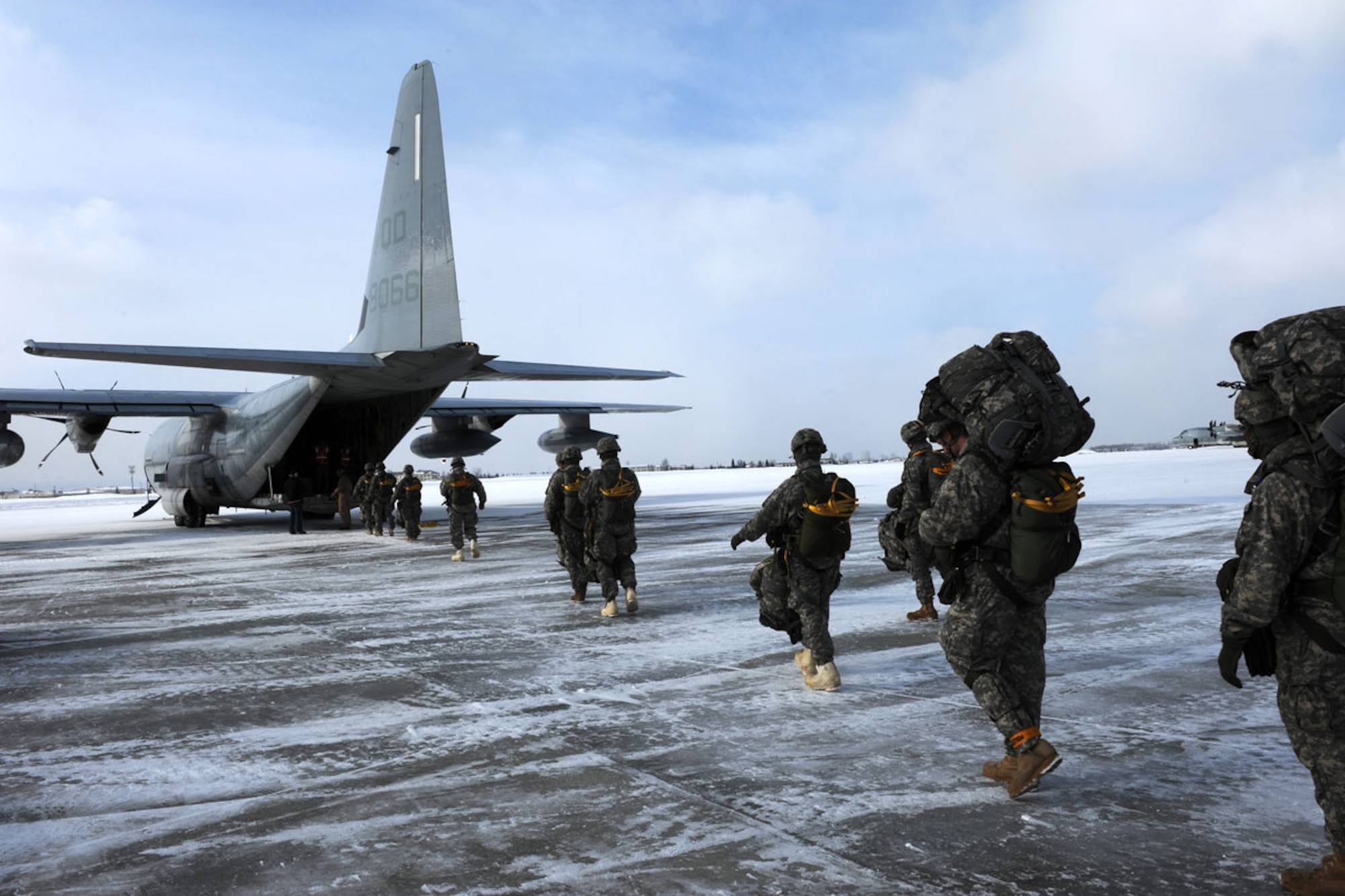 Paratroopers of 4th QM board a VMGR-152 KC-130 for an airdrop operation. (U.S. Air Force photo/Airman 1st Class Omari Bernard)