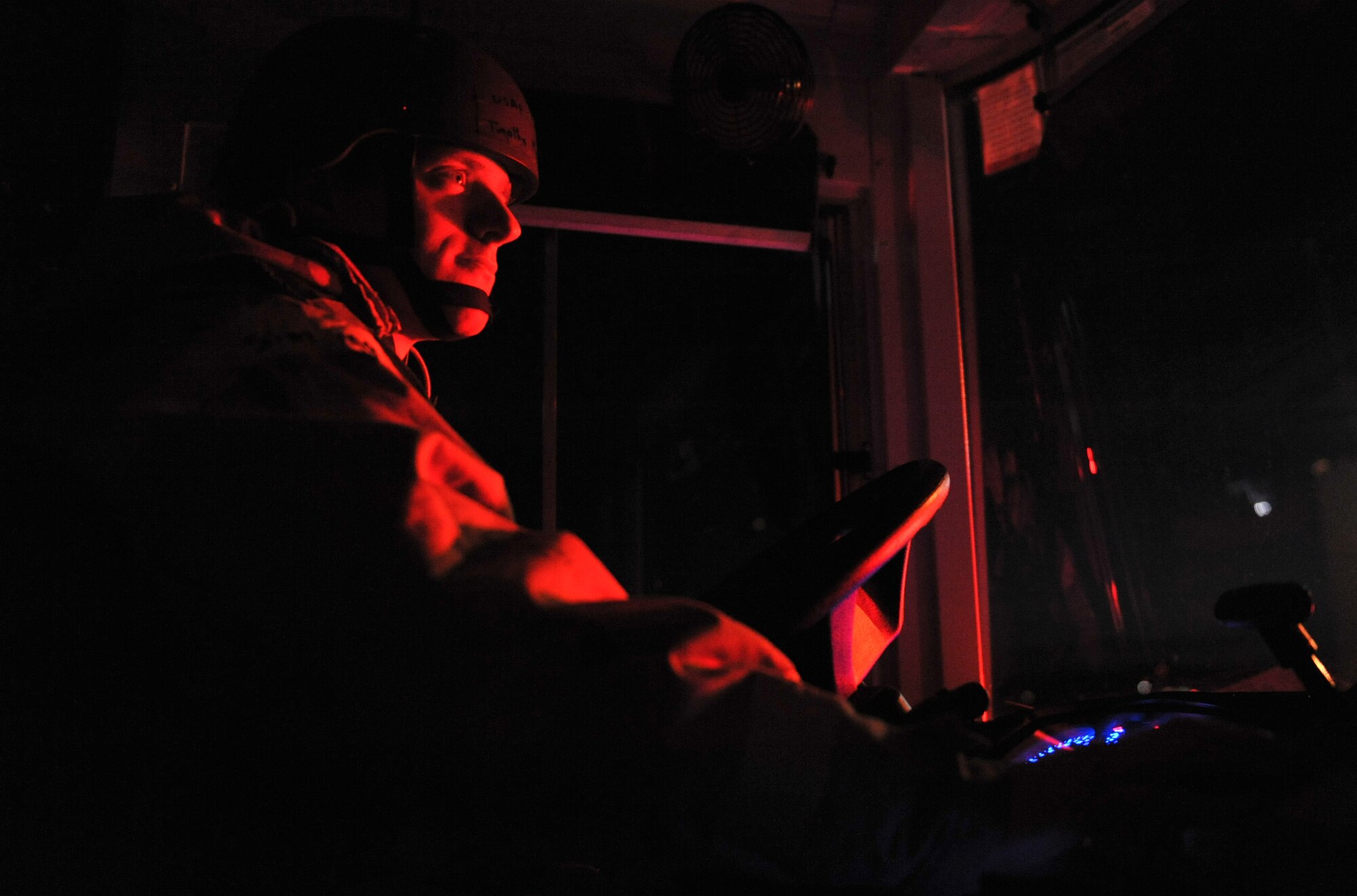 U.S. Air Force Senior Airman Timothy Morris, 366th Logistics Readiness Squadron vehicle operator, parks his bus behind another during an operational readiness exercise, April 11, 2013, at Mountain Home Air Force Base, Idaho. The exercise was held to prepare Airmen to respond to contingencies. (U.S. Air Force photo/Senior Airman Heather Hayward)