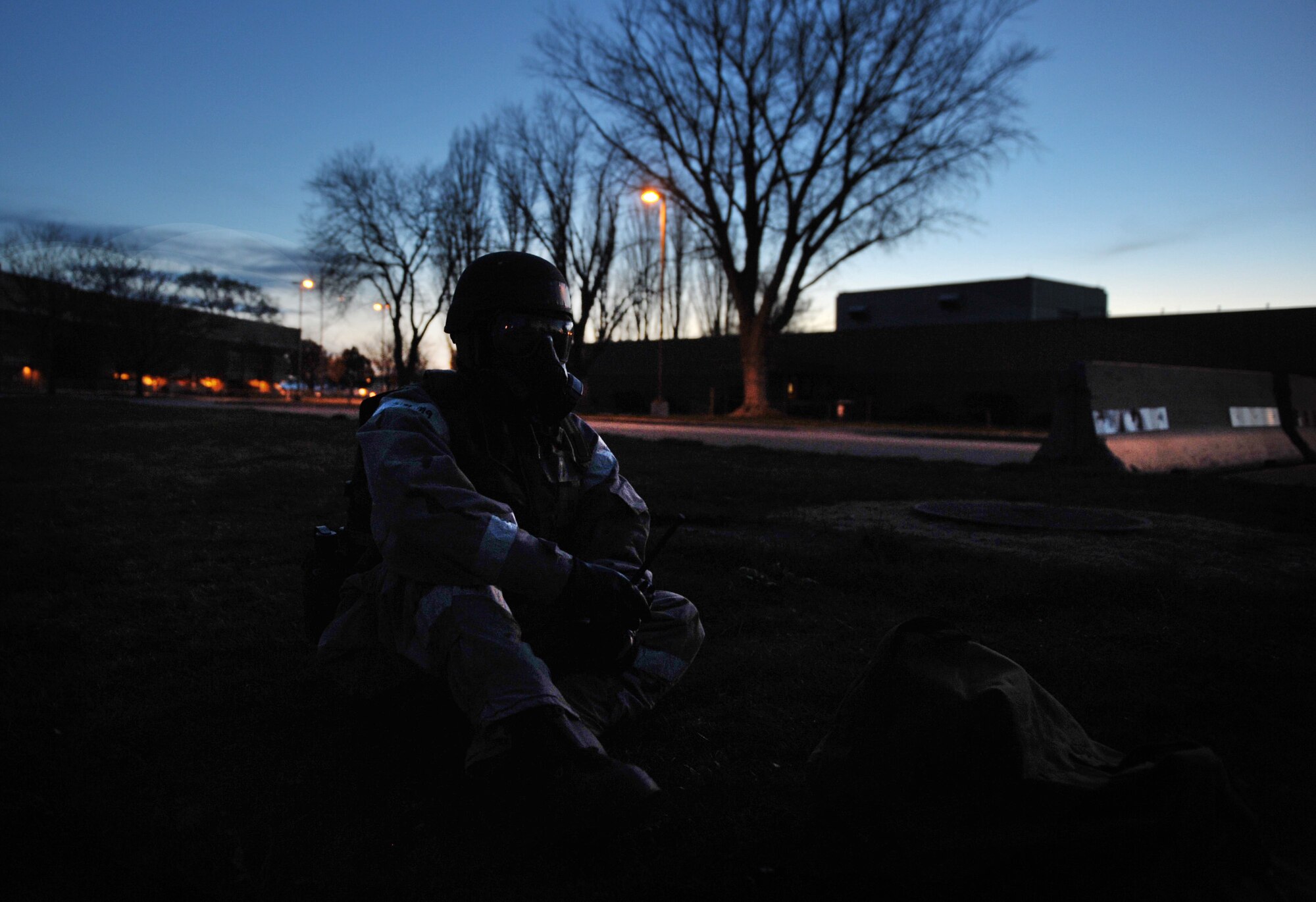 U.S. Air Force Senior Airman Timothy Morris, 366th Logistics Readiness Squadron vehicle operator, waits in a simulated bunker during an operational readiness exercise, April 11, 2013, at Mountain Home Air Force Base, Idaho. While under a simulated attack, Airmen are required to take cover just as they would in a real emergency. (U.S. Air Force photo/Senior Airman Heather Hayward)