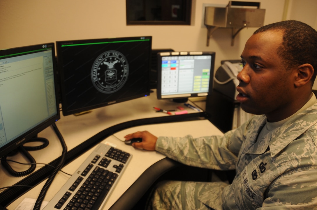 Air Force Staff Sgt. Greg Askew, 82nd Training Wing command post controller, at work at Sheppard Air Force Base, Texas, April 18, 2013.  Askew was recently named the 2012 Air Education and Training Command NCO of the Year for the command post career field. (U.S. Air Force photo/Dan Hawkins) 