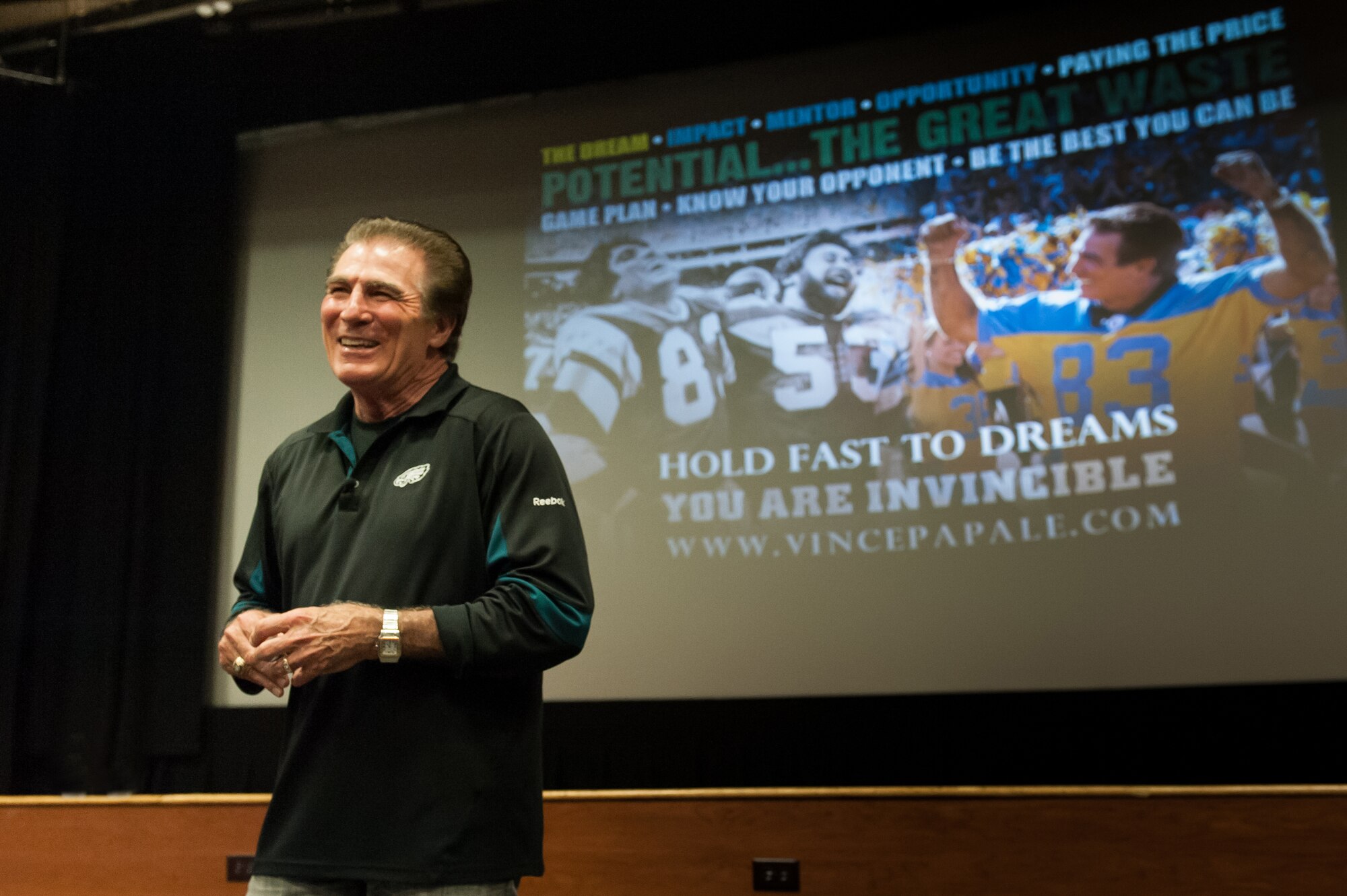 Vince Papale, former Philadelphia Eagles football player, addresses the joint base community April 11, 2013, at Joint Base McGuire-Dix-Lakehurst, N.J. Papale delivered his message of "living the dream" growing up in Philadelphia, the Eagles training camp, the making of the movie "Invincible" and how he survived cancer. (U.S. Air Force photo by Russ Meseroll/Released)