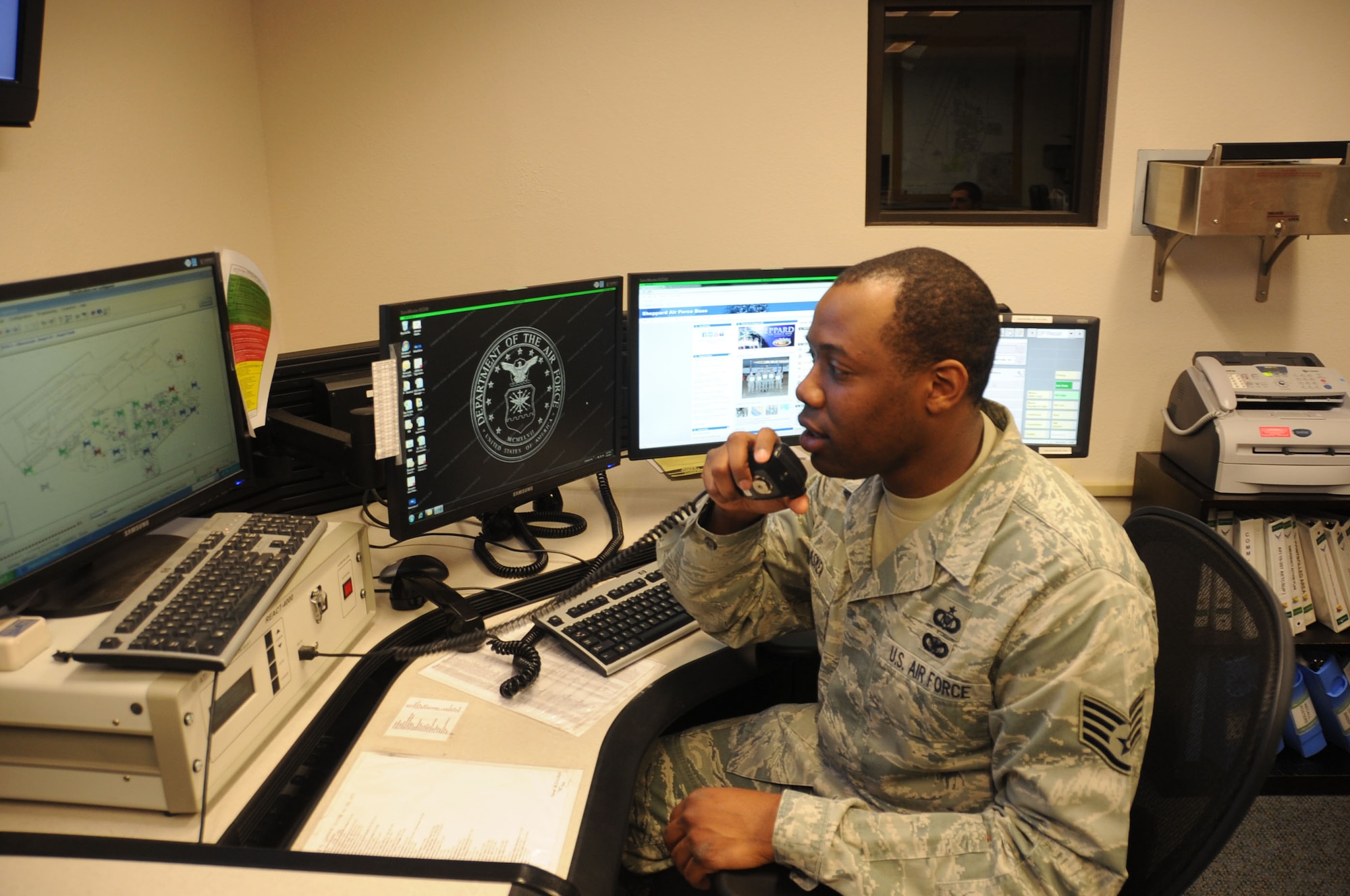 Staff Sgt. Greg Askew, 82nd Training Wing command post controller, makes a "Giant Voice" recording at Sheppard Air Force Base, Texas, April 18, 2013.  Askew was recently named the 2012 Air Education and Training Command NCO of the Year for the command post career field.  (U.S. Air Force photo/Dan Hawkins) 