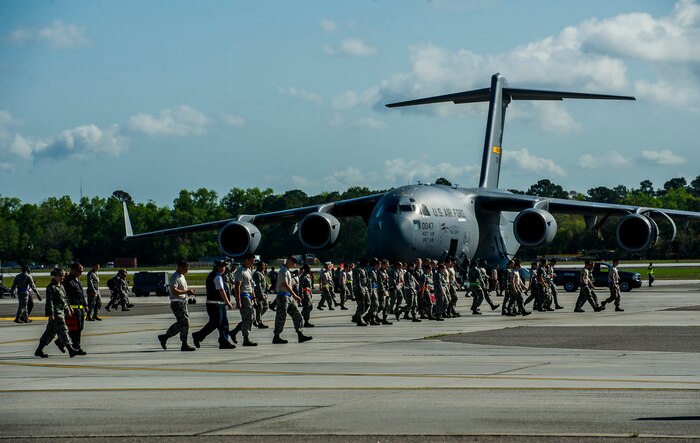 Joint Base Charleston personnel perform a foreign object debris  walk after participating aircraft took off during a training exercise April 10, 2013, at Joint Base Charleston – Air Base, S.C. Thirteen C-17s participated in the exercise which included airdrops, aerial refueling and low-level tactical training. The exercise is a total-force effort with aircrews consisting of active-duty Airmen from the 437th Airlift Wing and 315th AW, and completed over 600 training requirements in a single day. (U.S. Air Force photo/ Senior Airman George Goslin)