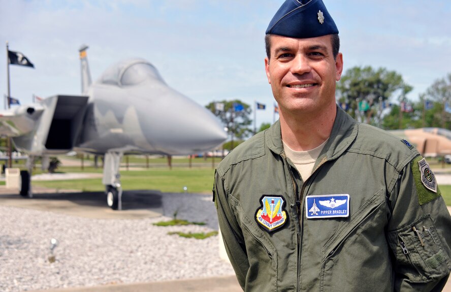 Lt. Col. Matthew “Pipper” Bradley, 83rd Fighter Weapons Squadron operations director, stands in front of a F-15 Eagle (A-model). He has been selected as Thunderbird No. 1. (U.S. Air Force photo by Master Sgt. J Scott Wilcox)