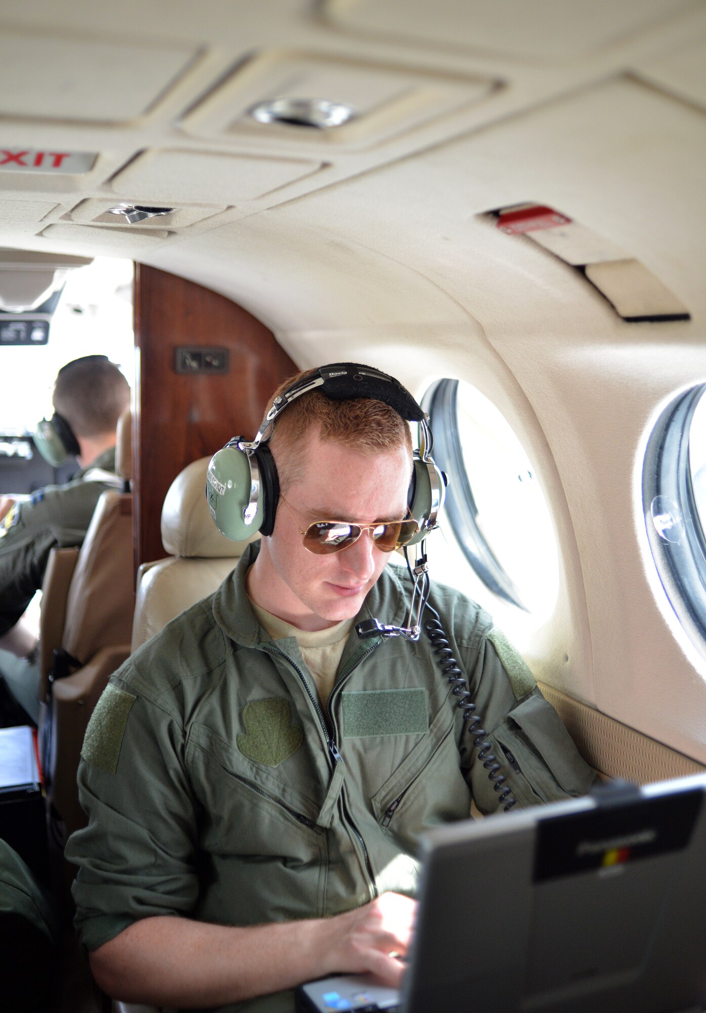 Tactical systems operators and students assigned to the 306th Intelligence Squadron perform airborne Intelligence, Surveillance and Reconnaissance procedures aboard a C-12 King Air aircraft at Beale Air Force Base, Calif., April 5, 2013. The squadron, which falls under the 361st ISR group at Hurlburt Field, Fla., instructs more than 150 Airmen each year. (U.S. Air Force photo by Airman 1st Class Drew Buchanan/Released)