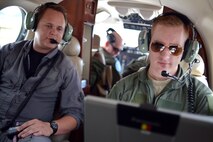 Tactical systems operators and students assigned to the 306th Intelligence Squadron perform airborne Intelligence, Surveillance and Reconnaissance procedures aboard a C-12 King Air aircraft at Beale Air Force Base, Calif., April 5, 2013. (U.S. Air Force photo by Airman 1st Class Drew Buchanan/Released)