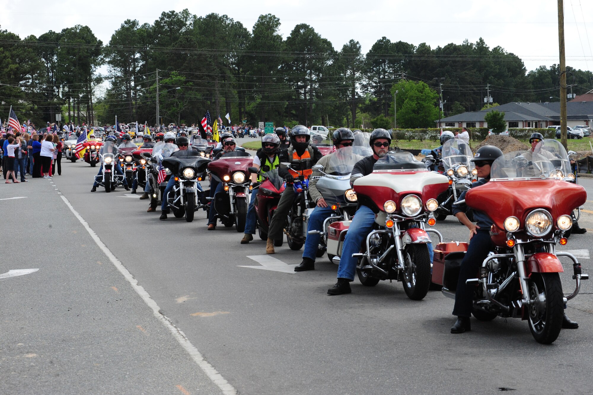 More than 350 motorcyclists usher in the Vietnam Veterans Memorial Traveling Wall as it arrives at the Wayne Community College campus in Goldsboro, N.C., April 16, 2013.  Goldsboro was the wall’s final stop in North Carolina this year. (U.S. Air Force photo by Airman 1st Class Mariah Tolbert/Released)