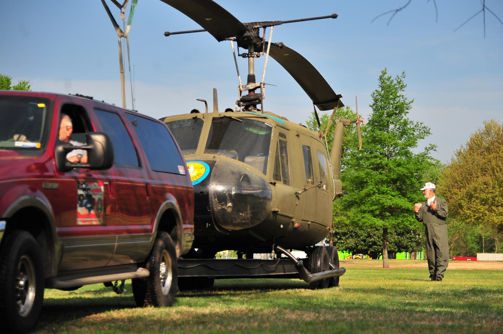 A Bell UH-1 Iroquois helicopter is backed onto a lawn to be displayed at the Wayne Community College campus in Goldsboro, N.C., April 17, 2013. The helicopter’s first combat operation was during the Vietnam War. Various helicopters flown during the war were displayed as a part of the Vietnam Veterans Memorial Traveling Wall event. (U.S. Air Force photo by Airman 1st Class Aubrey White/Released)