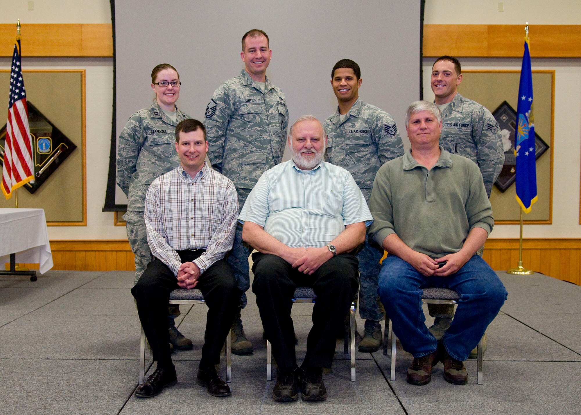 Winners of this quarter’s Wing Quarterly Awards pose for a photo at the Grizzly Bend on April 16.  Pictured from left to right are: (back row) Company Grade Officer of the Quarter, Capt. Julie Carpenter, 341st Medical Group; Senior Noncommissioned Officer of the Quarter, Master Sgt. Cameron Smith, 341st Operations Group; Noncommissioned Officer of the Quarter, Staff Sgt. Dorian Owens, 341st Missile Wing; and Airman of the Quarter and Honor Guard Member of the Quarter, Senior Airman Jeremy Alexander, 341st Maintenance Group.  (Front row) Civilian of the Quarter Category II, Kevin Younkin, 341st OG; Civilian Supervisor of the Quarter Category I, Mike Morhardt, 341st Mission Support Group; Civilian Supervisor of the Quarter Category II, Dale Huschka, 341st MSG.  Not Pictured: Civilian of the Quarter Category I, Ryan Burke, 341st MSG.  The 341st Logistics Readiness Squadron General Purpose Vehicle Maintenance Section won Team of the Quarter, Dorm 740 won Outstanding Dormitory of the Quarter; and Senior Airman Regina Livingston, 341st MDG, from Dorm 635 won Room of the Quarter.