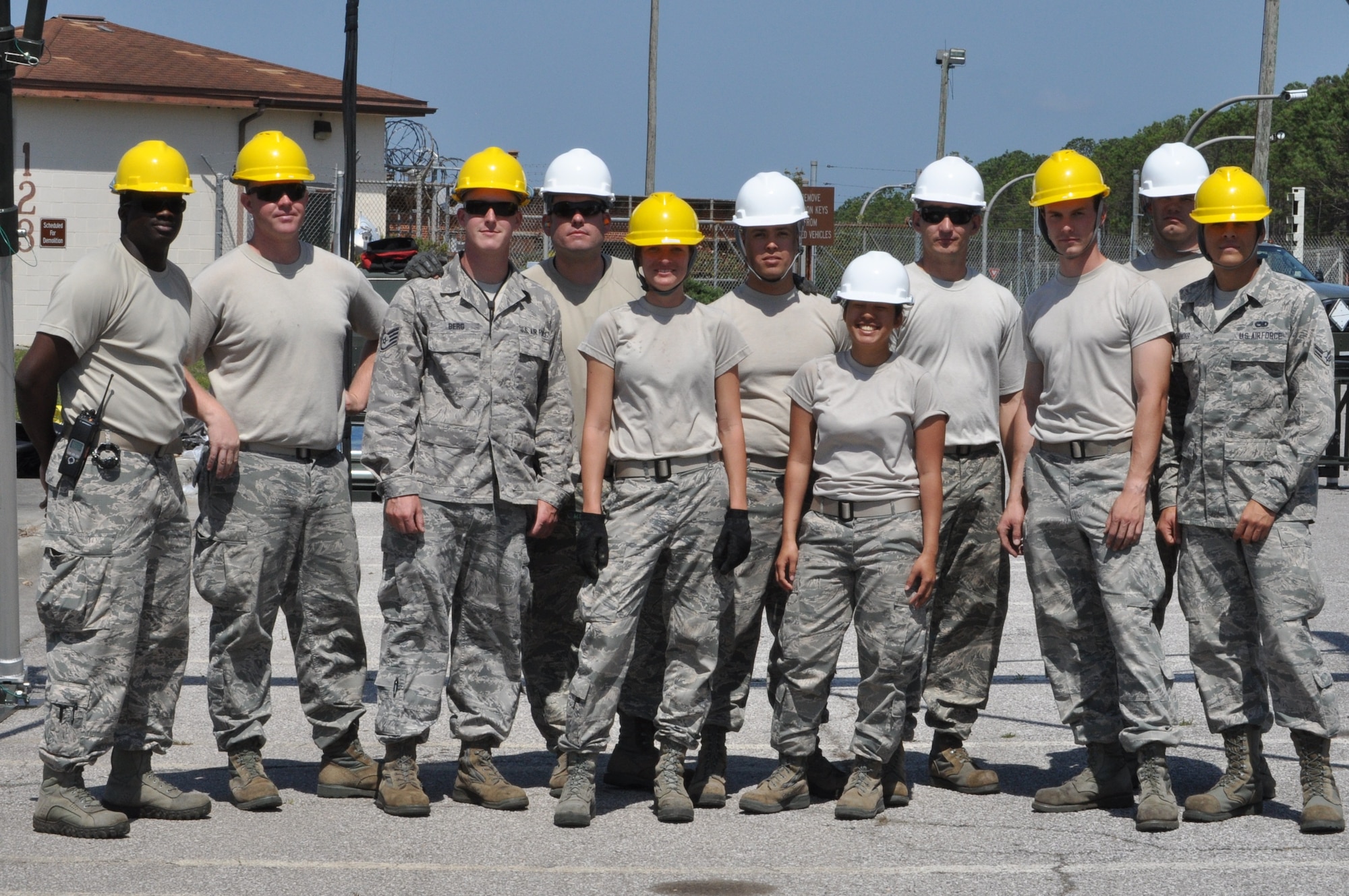 Members of the 325th Maintenance Squadron build the Munitions Assembly Conveyor II for the first time on April 10 in the Alert Facility parking lot on Tyndall Air Force Base. The MAC II is a system that acts as an assembly line for munitions and speeds up the process of their build. (U.S. Air Force photo by Airman 1st Class Alex Echols)