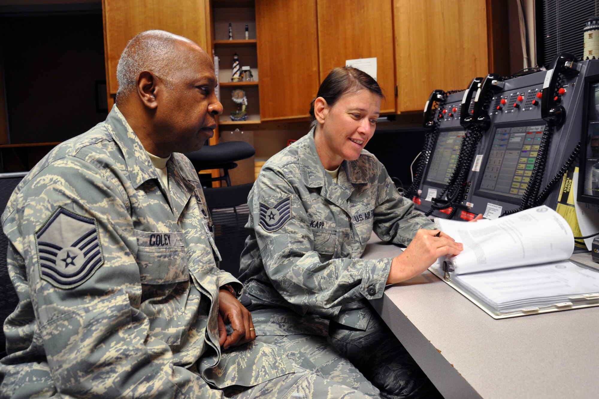 Master Sgt. James Coley and Tech. Sgt. Charlene Kapp are just two members of the 916th Command Post, one of the most successful command post operations in Air Force Reserve Command. (USAF photo by SSgt. Alan Abernethy, 916ARW/PA)