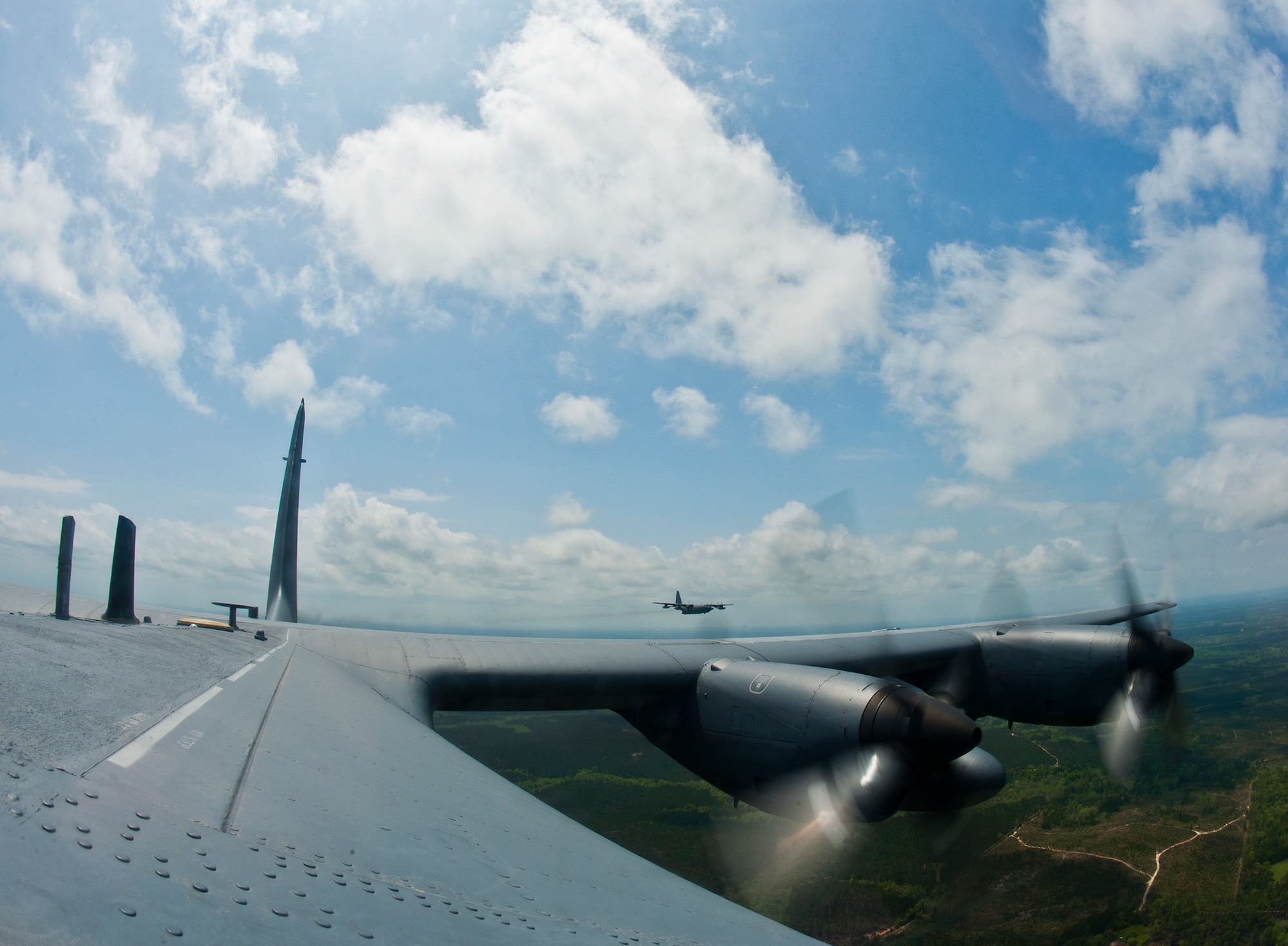 A two-ship of MC-130E Combat Talon Is fly over the Eglin Air Force Base range April 15 on their final sortie before retirement. The last five Talons in the Air Force belong to the 919th Special Operations Wing and are scheduled to be retired at a ceremony April 25.  They will make one final flight to the “boneyard” at Davis-Monthan Air Force Base, Ariz., by the end of the fiscal year.  (U.S. Air Force photo/Tech. Sgt. Samuel King Jr.)