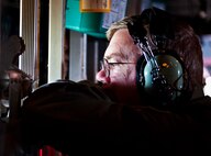 Newly retired Col. (Dr.) Ed Seeliger, the former 919th Medical Squadron commander, checks out the view from an MC-130E Combat Talon I during its final sortie before its retired as well.  Seeliger spent 30 years in the Air Force Reserve, all at Duke Field.  C-130s have been a part of Duke Field for more than 40 years. The last five Talons in the Air Force are scheduled to be retired at a ceremony April 25.  They will make one final flight to the “boneyard” at Davis-Monthan Air Force Base, Ariz., by the end of the fiscal year.  (U.S. Air Force photo/Tech. Sgt. Samuel King Jr.)