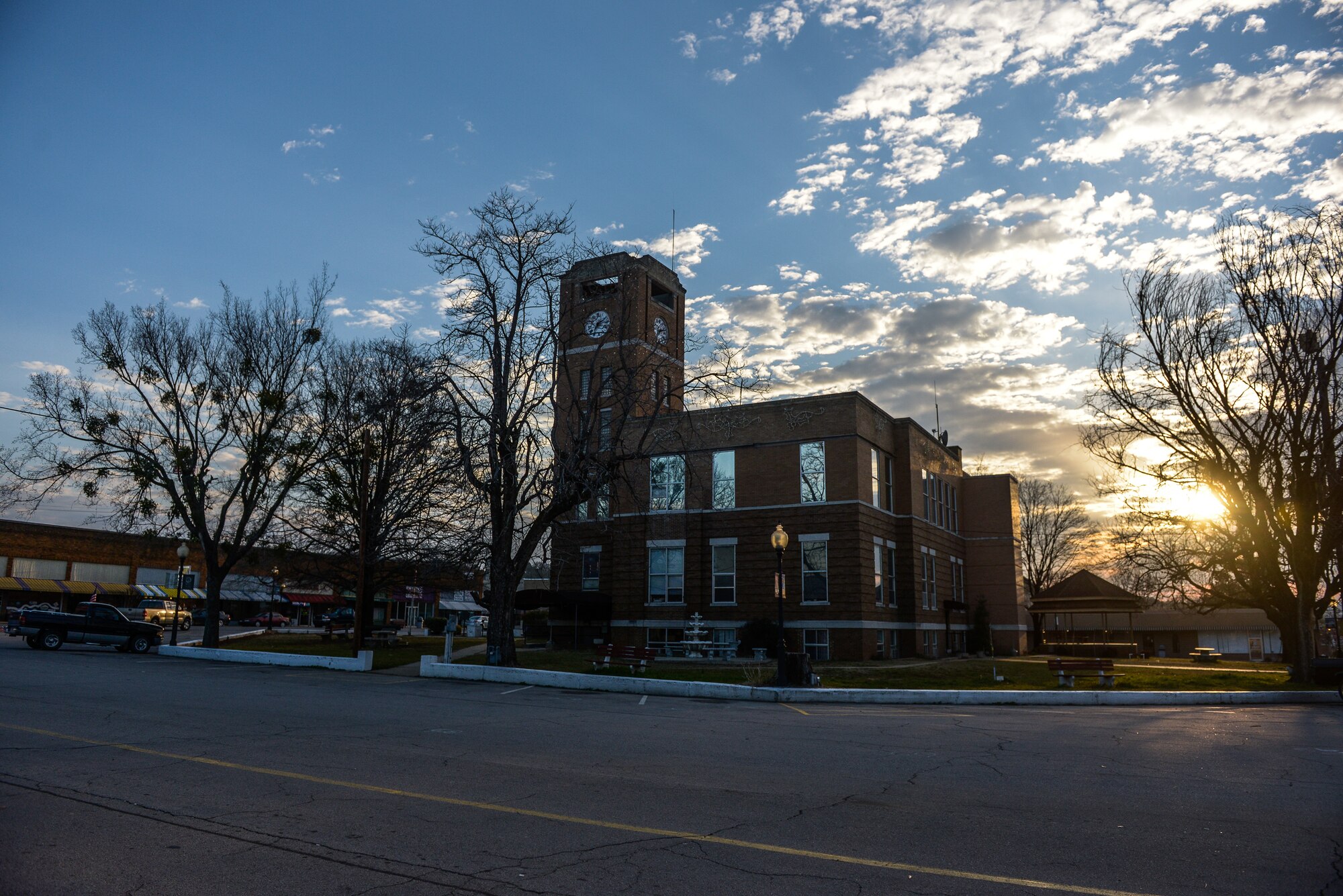 The sun rises over the Franklin County Courthouse March 9, 2013, in Ozark, Ark. The courthouse anchors the city square, which is also home to historic sites and small business. 