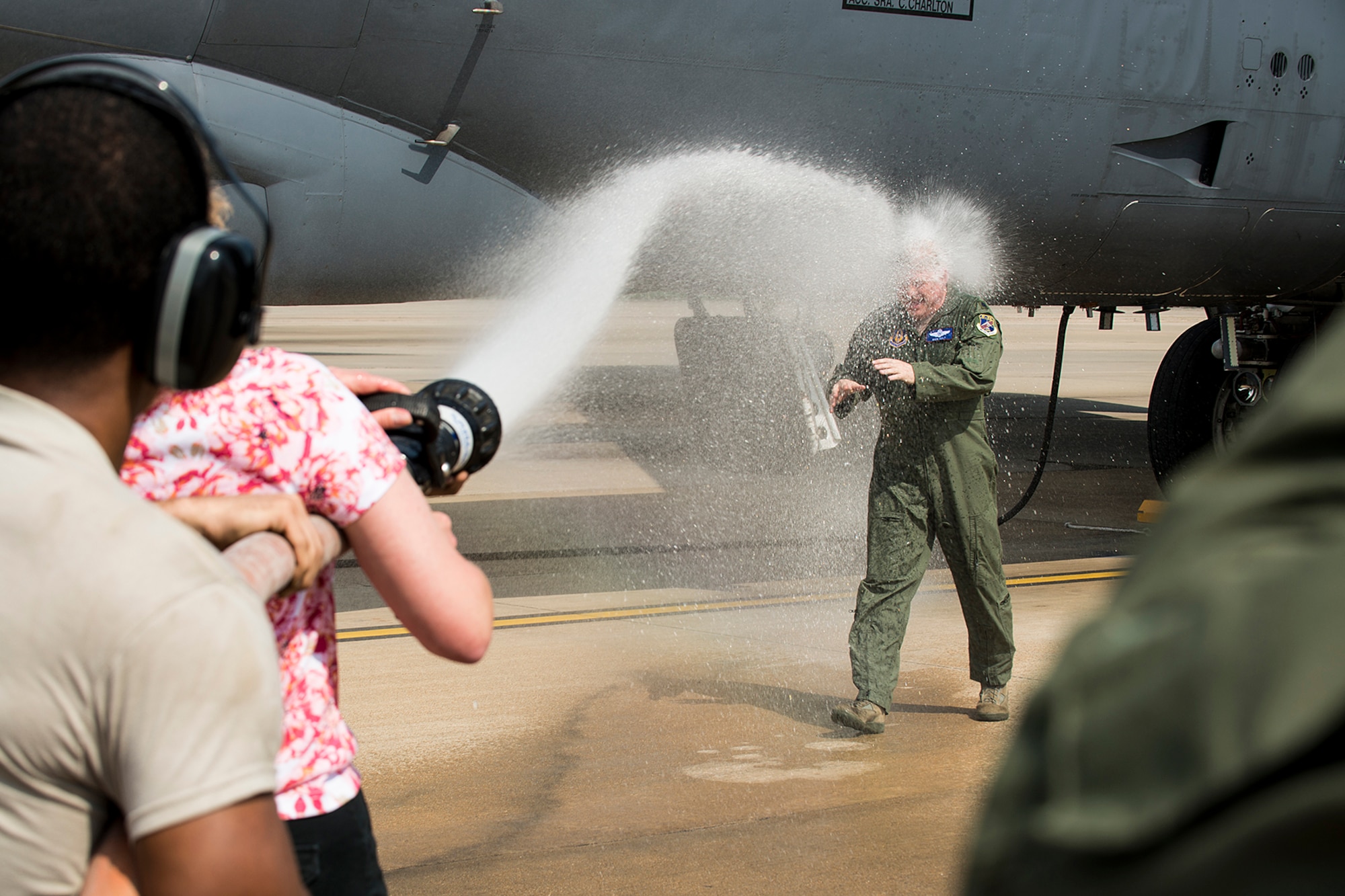U.S. Air Force Lt. Col. Rick Holt gets it in the face after returning from his last sortie in a B-52H Stratofortress, April 16, 2013, Barksdale Air Force Base, La. Holt is an Electronic Warfare Officer assigned to the 93rd Bomb Squadron, 307th Bomb Wing, and is retiring after 28 years of service. (U.S. Air Force photo by Master Sgt. Greg Steele/Released)