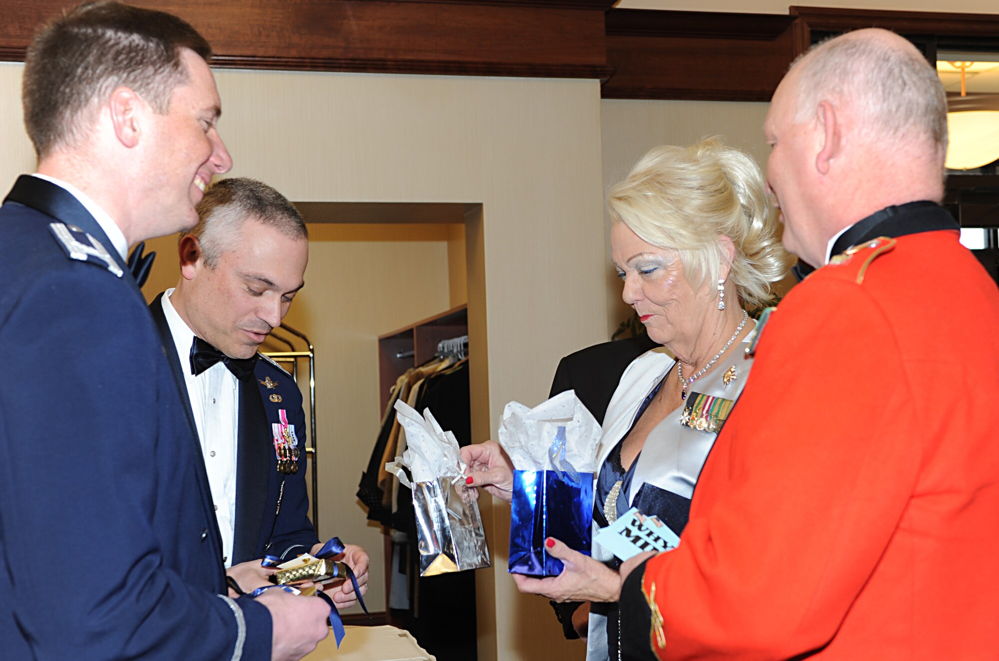 MINOT, N.D. -- The International Military Ball took place at the Holiday Inn Riverside in Minot, April 13. The ball offered Team Minot an opportunity to share a night of fellowship and fun while visiting members of the Canadian military. The night’s events included fine dining, a gift, live entertainment and guest speakers from the local community. The ball is held every year as a way to strengthen the bonds of friendship and trust between the Air Force and its allies to the North. (U.S. Air Force photo/Airman 1st Class Stephanie Ashley)