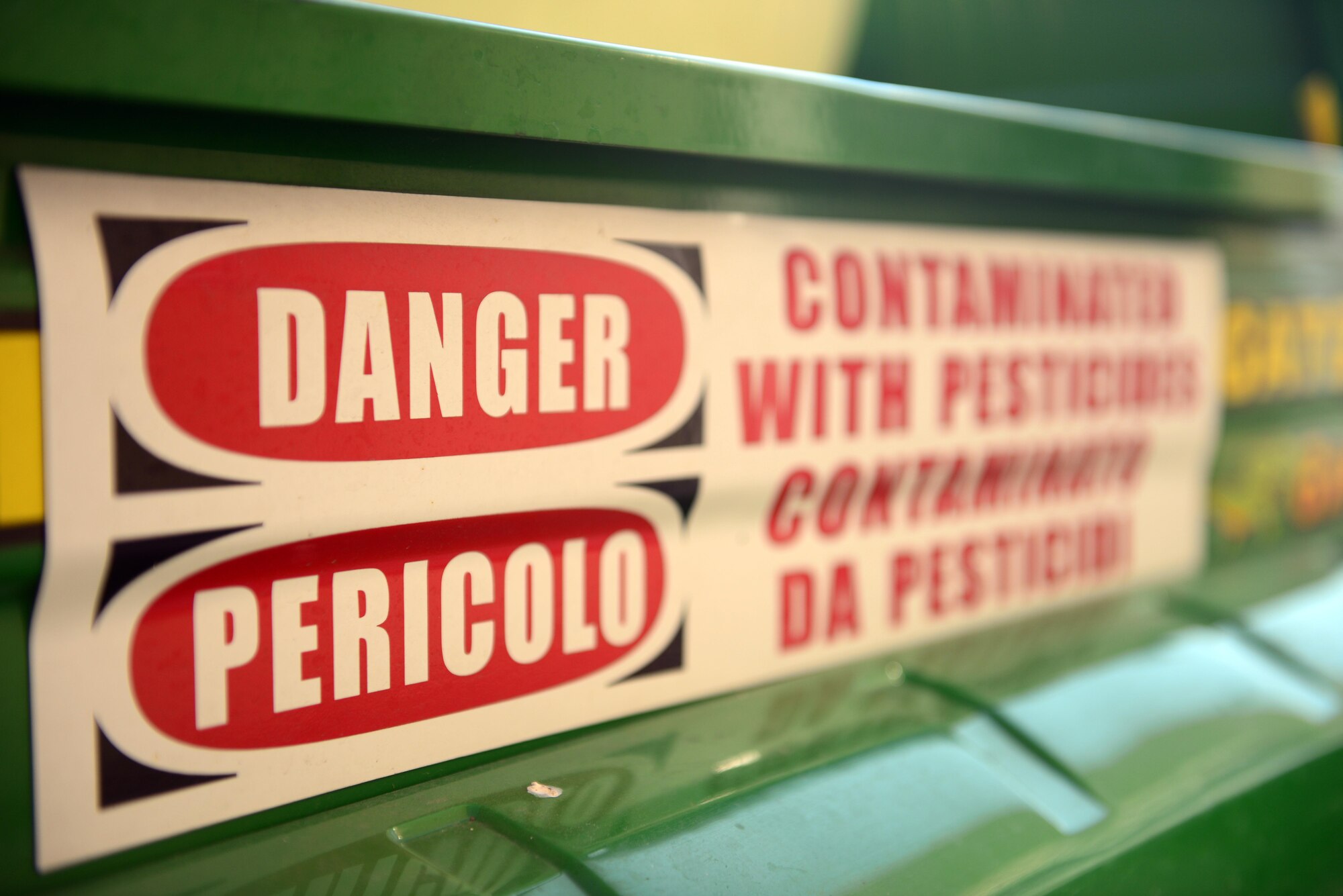 A danger label is placed on a John Deer Gator truck that carries
a WeedSeeker Model 650 pesticide, to remind personnel that the vehicle carries hazardous chemicals at Aviano Air Base, Italy April 15, 2013. As well as preventing weed growth, pest technicians are responsible for applying environmentally-friendly chemicals to exterminate any pests on base and removing carcasses off the road. (U.S. Air Force photo/Airman 1st Class Matthew Lotz)