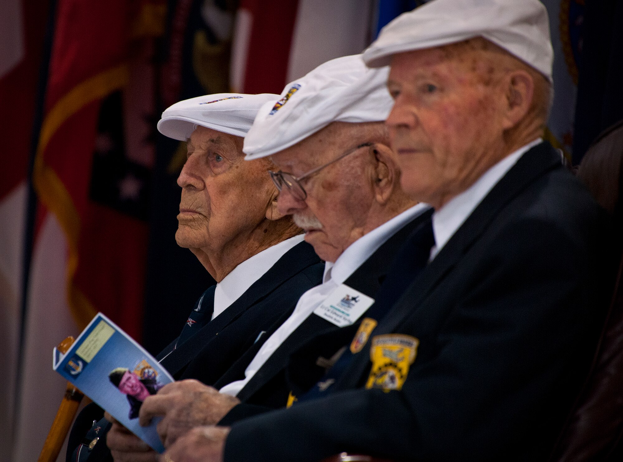Doolittle Raiders, Col. Dick Cole, Lt. Col. Ed Saylor and Staff Sgt. David Thatcher, were on hand at the 33rd Fighter Wing hangar dedication in honor of Saylor April 17 at Eglin Air Force Base, Fla.  After unveiling the plaque with his name on it, Saylor spoke about his experiences in the military and with the historic Raiders.  For the ceremony, an F-35A Lightning II and a Doolittle Raider B-25 were parked side by side in the hangar.  (U.S. Air Force photo/Samuel King Jr.)