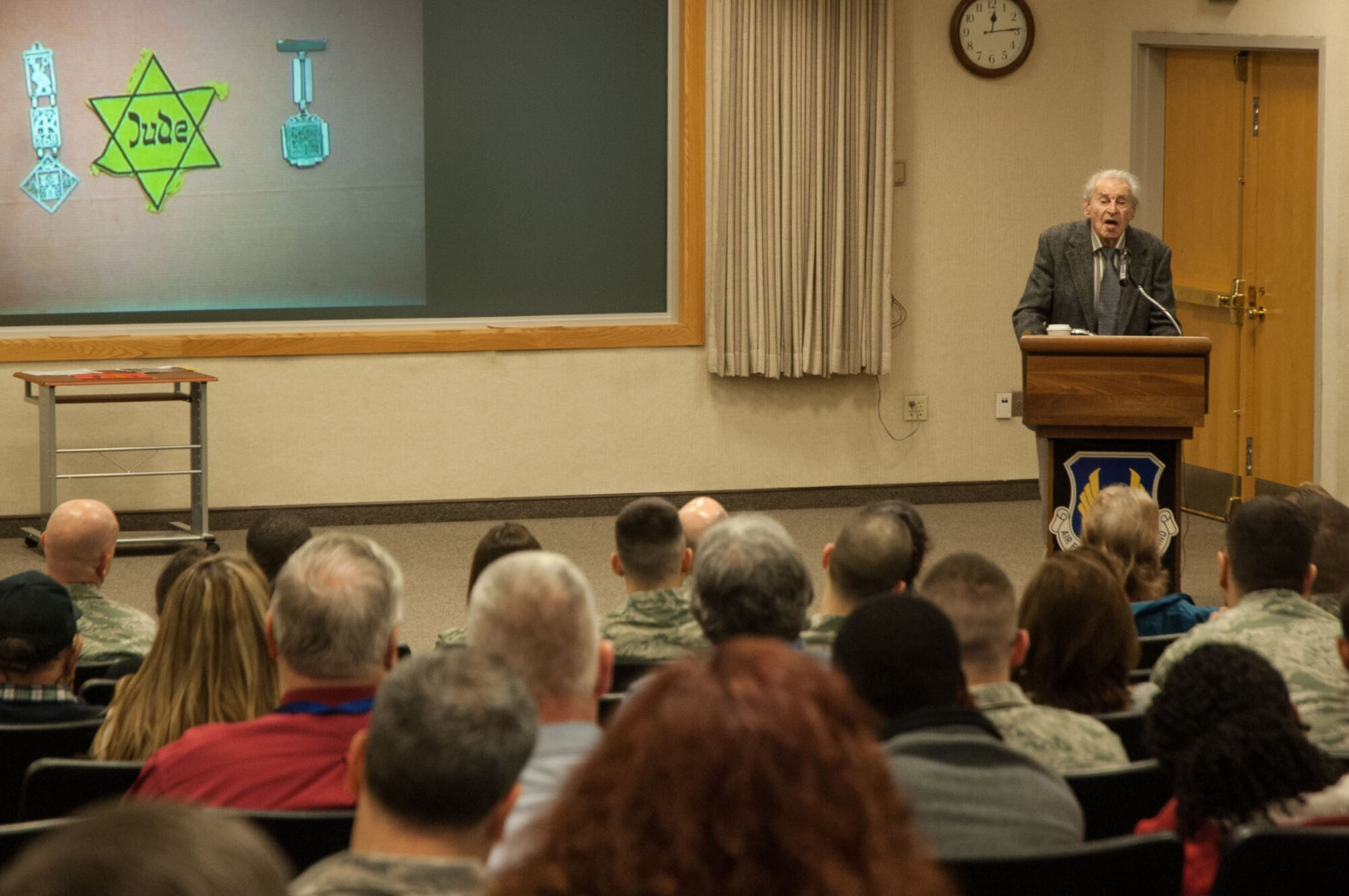 HANSCOM AIR FORCE BASE, Mass. - Holocaust survivor Edgar Krasa speaks to members of the Hanscom community during a Holocaust Days of Remembrance event at the Hanscom Conference Center April 11. Krasa has dedicated his life to educating people about the Holocaust. (U.S. Air Force photo by Mark Herlihy)