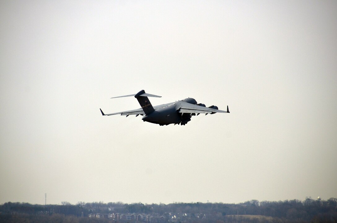 WRIGHT-PATTERSON AIR FORCE BASE, Ohio – A 445th Airlift Wing C-17 Globemaster III practices touch and gos during a routine training mission on a sunny day in April at Wright-Patterson Air Force Base, Ohio. Touch and gos involve landing on a runway and taking off again without coming to a full stop. (U.S. Air Force photo/Staff Sgt. Mikhail Berlin)