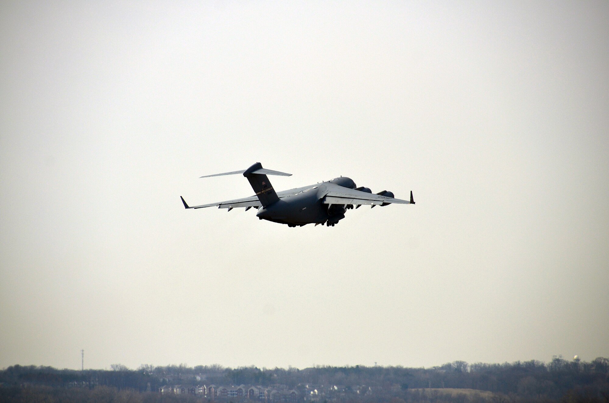 WRIGHT-PATTERSON AIR FORCE BASE, Ohio – A 445th Airlift Wing C-17 Globemaster III practices touch and gos during a routine training mission on a sunny day in April at Wright-Patterson Air Force Base, Ohio. Touch and gos involve landing on a runway and taking off again without coming to a full stop. (U.S. Air Force photo/Staff Sgt. Mikhail Berlin)