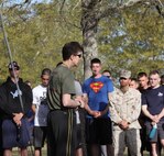 Lt. Col. Denise Mull, the commanding officer for Combat Logistics Battalion 2, 2nd Marine Logistics Group speaks to servicemembers before a field meet aboard Camp Lejeune, N.C., April 11, 2013. The meet was designed to let Marines and sailors relax and build camaraderie after returning from a deployment. (U.S. Photo by Lance Cpl. Shawn Valosin)