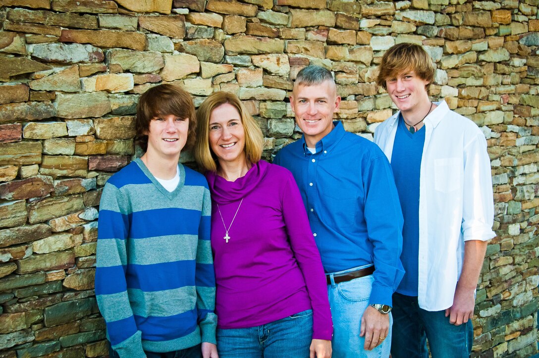 Karen and her husband, Lt. Col. Sean Charney and their sons, (left) Spencer, 14 and (right) Joshua, 15 visit the Semper Fidelis Memorial Chapel outside the National Museum of the Marine Corps on Sept. 23, 2012. (Photo by Corry Frazier)