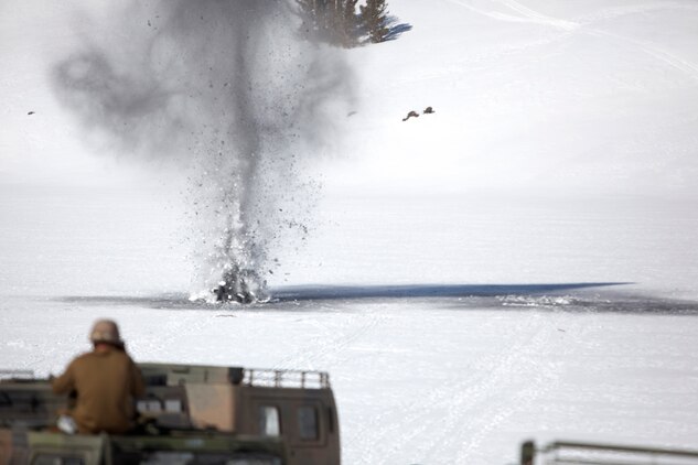 MOUNTAIN WARFARE TRAINING CENTER, BRIDGEPORT, Calif. - Marines with 2nd Battalion, 3rd Marine Regiment, conduct an ice breaching exercise on Lake Leavitt at Mountain Warfare Training Center in Bridgeport, Calif., April 10, 2013. (U.S. Marine Corps photo by Lance Cpl. Suzanna Lapi)