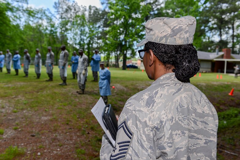 National Guard Senior Master Sgt. Trude Ellis-Jamison observes Airmen during a search and recovery exercise, April 18, 2013 at Savannah Air National Guard base in Garden City, Ga. (National Guard photo by Tech. Sgt. Charles Delano/released)