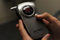 A breathalyzer is being used at the medical clinic on Scott Air Force Base, Ill., April 17, 2013.  The alcohol  and drug abuse prevention and treatment program uses breathlyzers to test the alchol content of a persons blood. (U.S. Air Force photo/Airman 1st Class Jaeda Waffer)