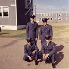 Airman Richard Bayne, top right poses for a photo with fellow airmen outside of barracks in the early 1960s. Bayne, who retired from the Air Force in 1994 as a Chief Master Sgt. with 33 years of active duty service, is retiring from civil service April 30 after 52 years of total combined service to the U. S. Air Force. (Courtesy Photo)