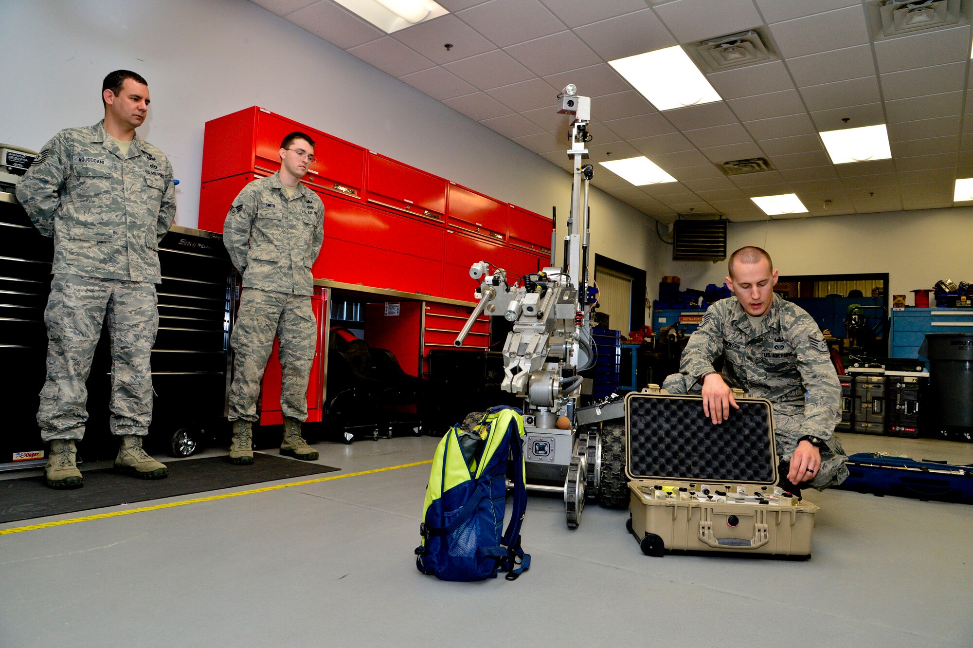 Staff Sgt. Benjamin McGovern, from the 436th Civil Engineer Squadron Explosive Ordnance Disposal Flight, demonstrates support equipment used by him and his team to render explosives safe at Dover Air Force Base, Del., April 16, 2013. The Media Day was an opportunity for media representatives to get a closer look at and a better understanding of Dover AFB's EOD Airmen and mission.
(U.S. Air Force photo/David S. Tucker)
