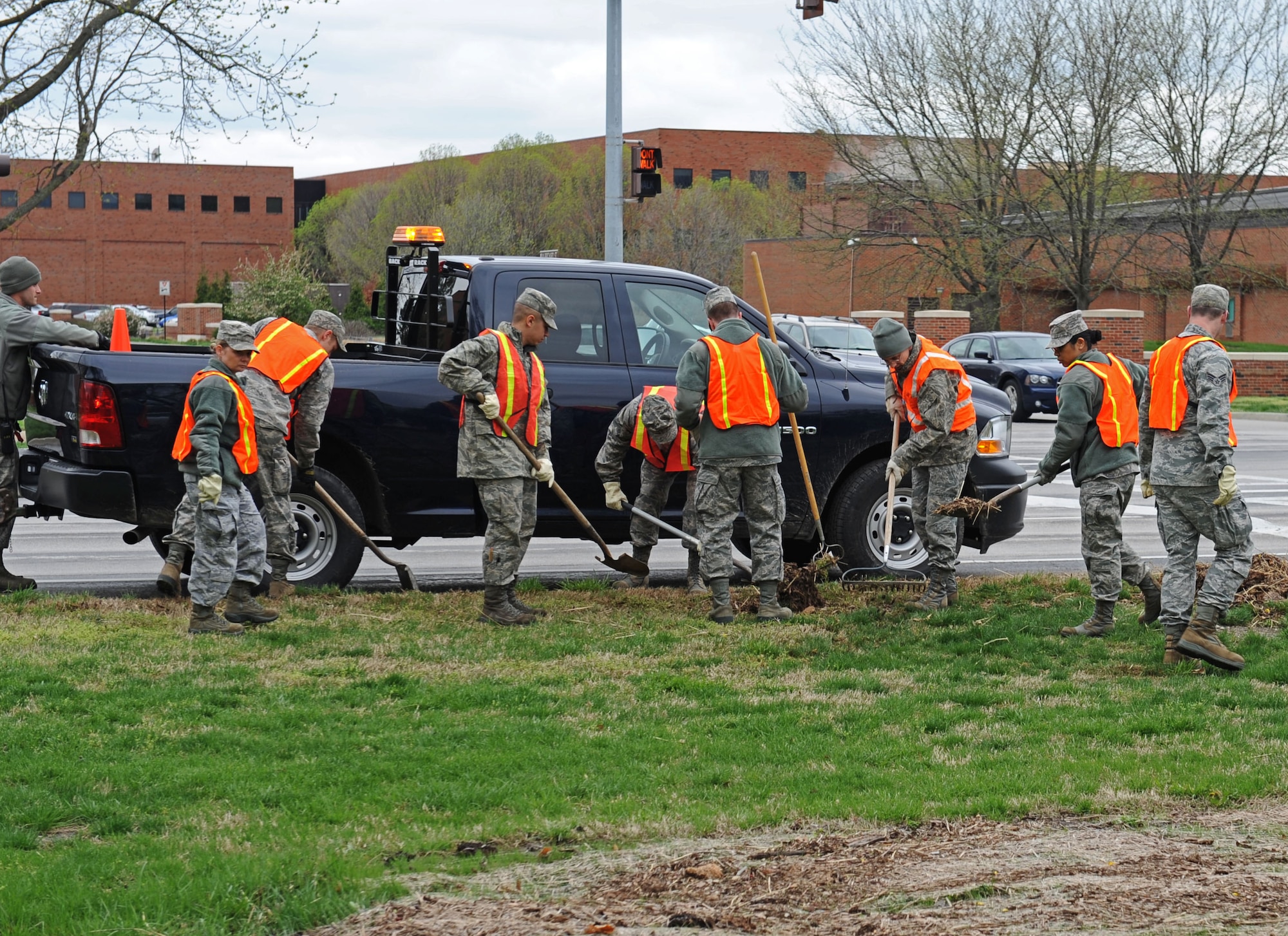 Members from Team Scott clean up debris April 19, 2013 left over from yesterday's flood  at Scott Air Force Base, Ill.  Severe weather dumped 5.2 inches of rain in five hours. (U.S. Air Force photo/Senior Airman Divine Cox)