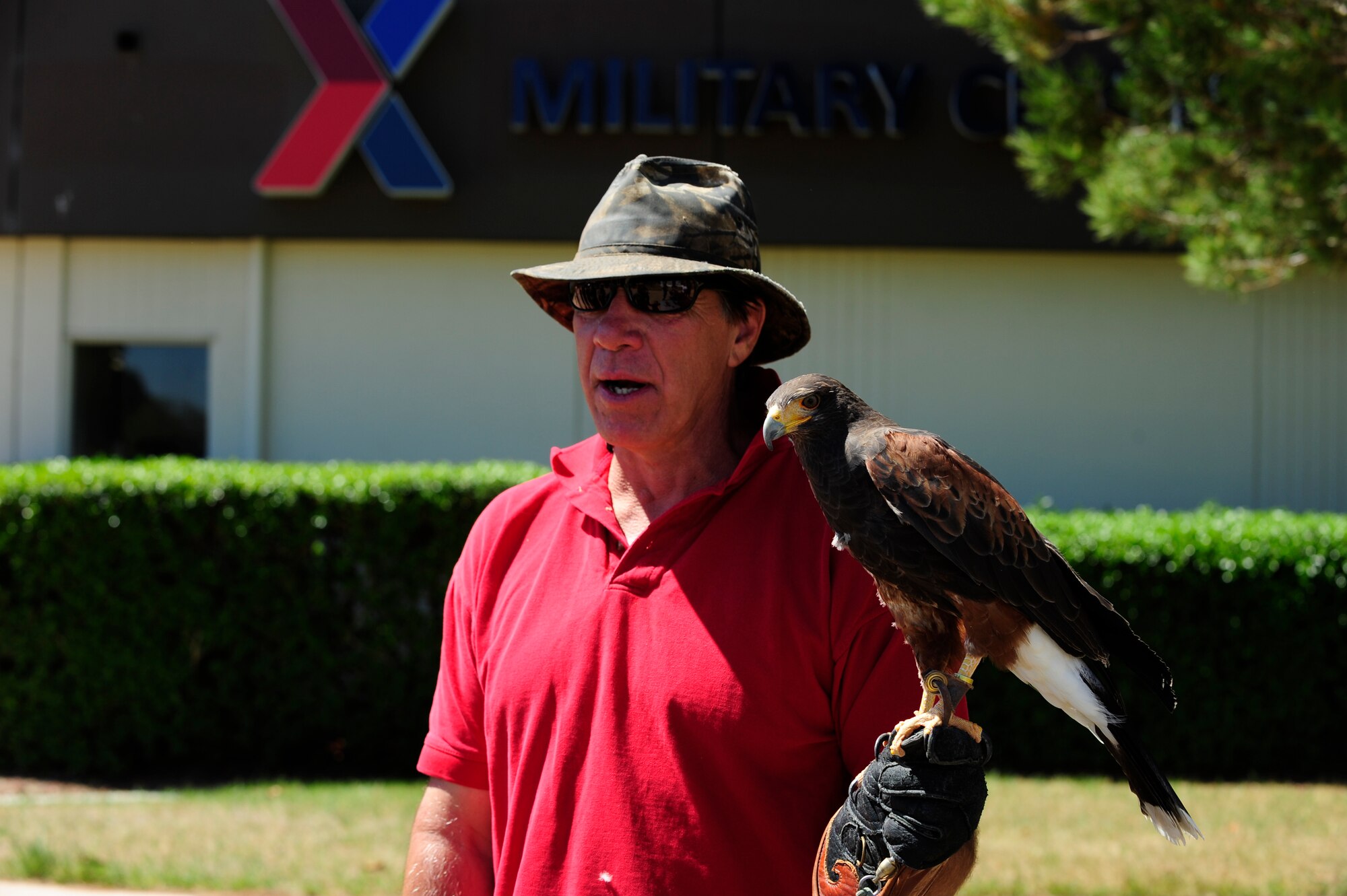 VANDENBERG AIR FORCE BASE, Calif. – Local area falconer, Craig Golden, Safari Depredation Company owner, holds a female raptor falcon during the 13th annual Earth Day event here Thursday, April 18, 2013. The Earth Day event is hosted by the 30th Civil Engineer Squadron and helps to promote awareness and appreciation for the environment. (U.S. Air Force photo/Senior Airman Lael Huss)